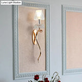 Traditional Clear Crystal Bedroom Wall Sconce Light - Gold Lamp With Curvy Metal Arm