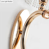 Traditional Clear Crystal Bedroom Wall Sconce Light - Gold Lamp With Curvy Metal Arm