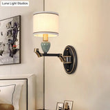 Traditional Drum Fabric Wall Sconce Lighting In Black For Bedroom - Half-Bulb Mount