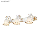 Traditional Ivory Glass Wall Sconce With Ruffled Trim - Bell Bathroom Light Fixture