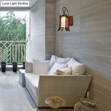 Traditional Red Brown Lantern Wall Sconce With Milk Glass Shade