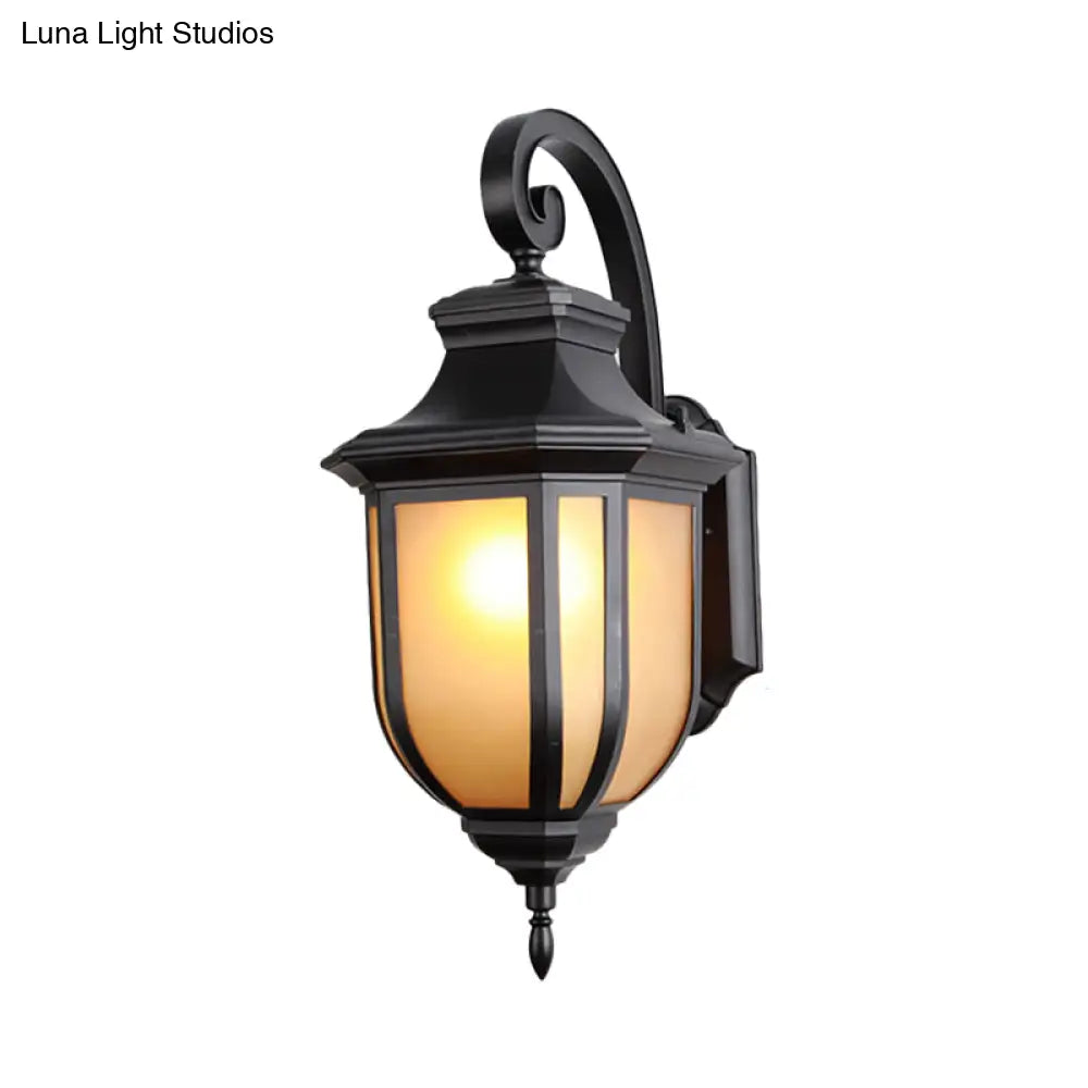 Traditional Style 1-Light Wall Mount Light Fixture - Black Lamp With Tan Glass Urn Shade