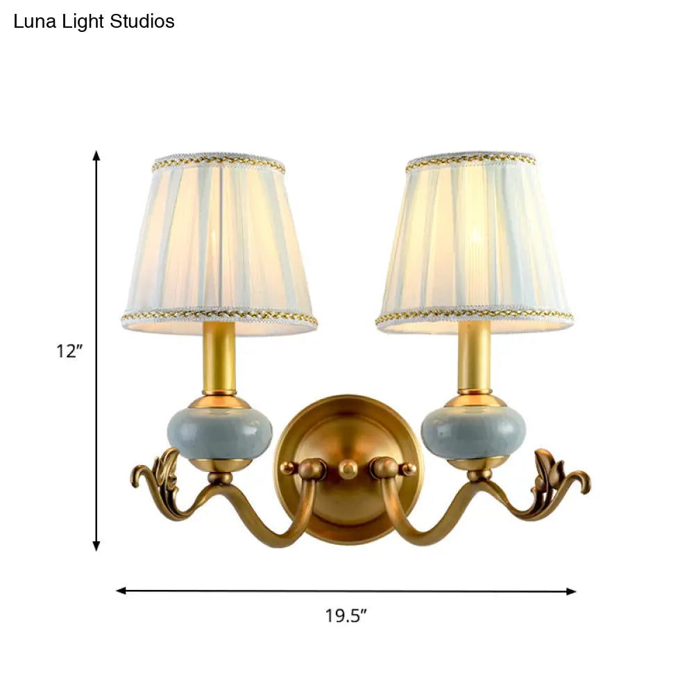 Traditional Style Brass Wall Sconce With Curved Arm Fabric Shade
