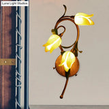 Traditional-Style Yellow Glass 3-Light Brass Bedroom Sconce