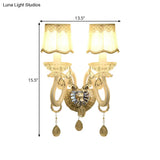Traditional White Candle Wall Lamp With Clear Crystal Accent And Scalloped Fabric Shade
