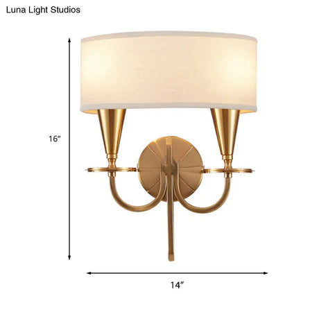 Vintage Brass Cylinder Wall Sconce With Fabric Shade And Arched Metal Arm - Ideal For Bedroom