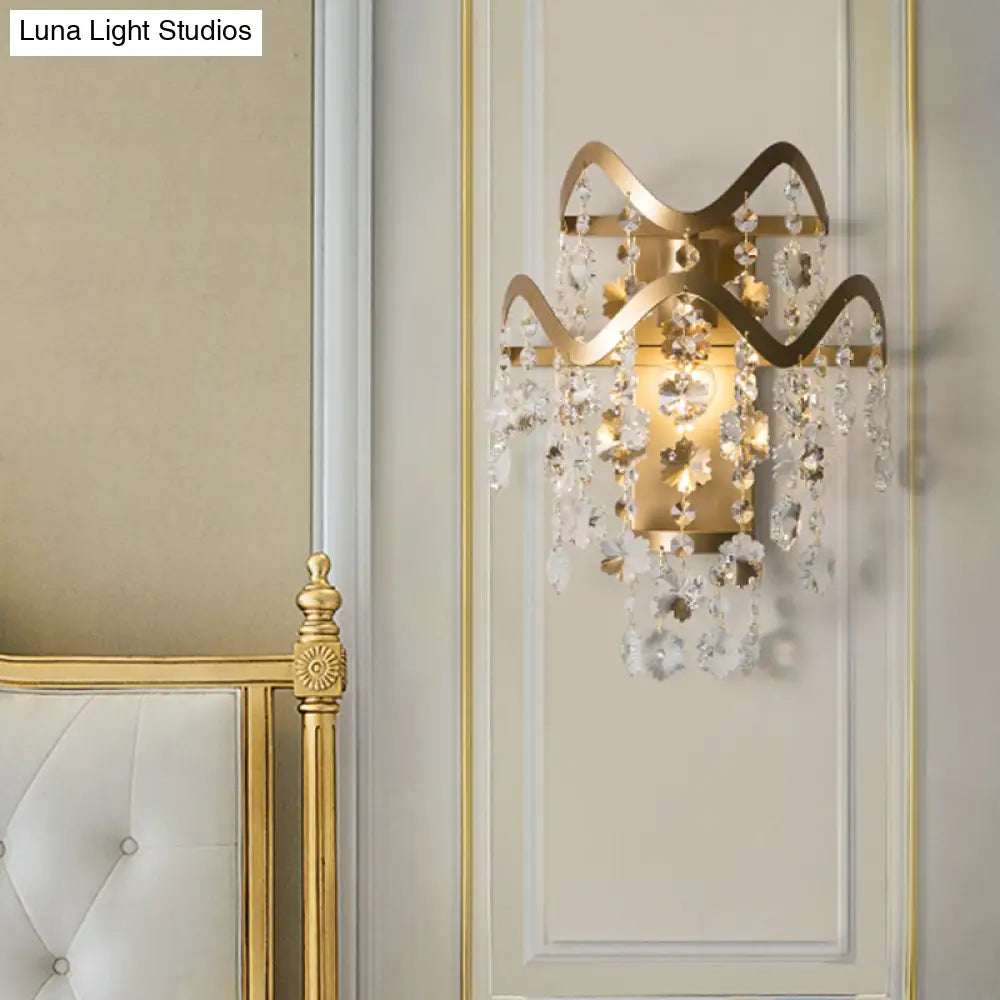Vintage Brass Led Wall Sconce With Crystal Strand Draping And Waveform Edge