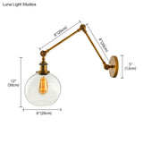 Vintage Brass Sconce: Clear Glass Spherical Lighting Fixture For Bedroom