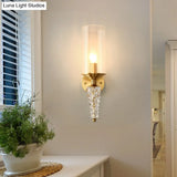 Vintage Brass Wall Mounted Bedside Lighting Fixture With Clear Glass Shade And 1 Bulb