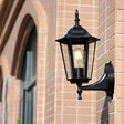 Vintage Clear Glass Wall Sconce: Tapered Single-Bulb Courtyard Lamp Black