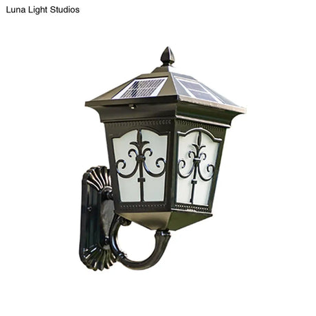 Vintage Courtyard Solar Wall Light - House Shaped Metal Lamp With Frost Glass Shade