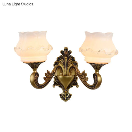 Vintage Curved Arm Brass Wall Lamp With Flower Milk Glass Shade