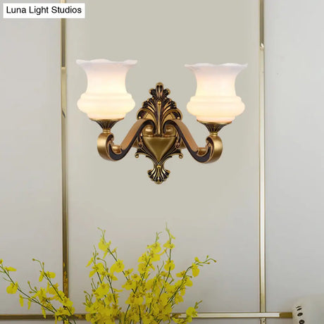 Vintage Curved Arm Brass Wall Lamp With Flower Milk Glass Shade