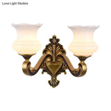 Vintage Curved Arm Brass Wall Lamp With Flower Milk Glass Shade