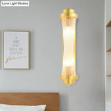 Vintage Gold Cylinder Wall Sconce With Clear Glass And Dual Led Lights For Bedroom