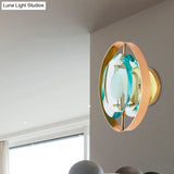 Vintage Gold Wall Sconce With Green Crystal Elliptical Shade And Circular Backplate