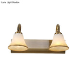 Vintage Opal Glass Bell Wall Mounted Vanity Sconce With Gold Finish And Metal Swooping Arm - 2/3/4