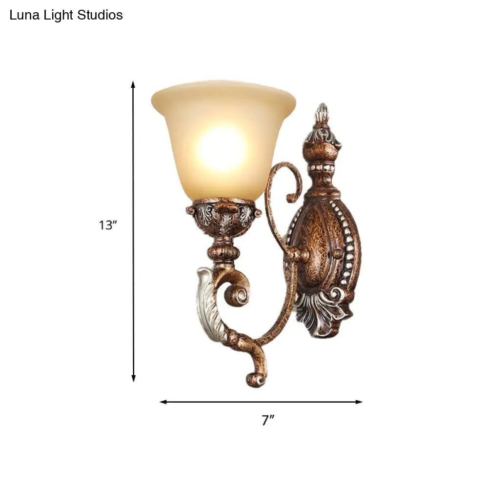 Vintage Sconce Light Fixture: 1-Light Frosted Glass Wall Mount With Carved Metal Arm In Rust