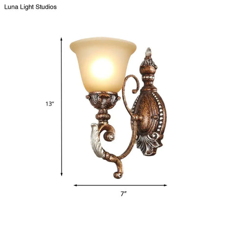 Vintage Sconce Light Fixture: 1-Light Frosted Glass Wall Mount With Carved Metal Arm In Rust