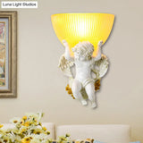 Vintage Silver/White/Beige Resin Angel Wall Lamp With Amber Fluted Glass Shade