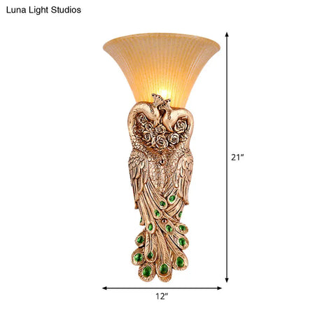 Wall Sconce With Countryside Design And Fluted Amber Glass - Peacock Decor In Gold