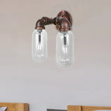 Weathered Copper 2-Light Industrial Sconce With Clear Glass Oval Shade - Wall Lighting Fixture / A