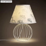 White 1-Light Desk Lamp With Traditional Fabric Shade And Wire Cage Base