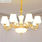 White Glass Gold Chandelier With Tapered Drop Pendant And Scrolled Arm Design