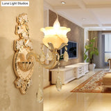 White Glass Wall Sconce With Crystal Draping Brass Mount - Traditional Candle Style Lighting (1/2