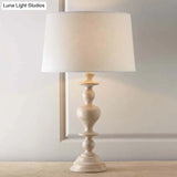 White Resin Base Fabric Nightstand Lamp With Classic Tapered Design