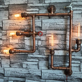 Wrought Iron Vintage Wall Sconce With Aged Brass Finish & 5 Bare Bulb Lights - Piped Design Mount